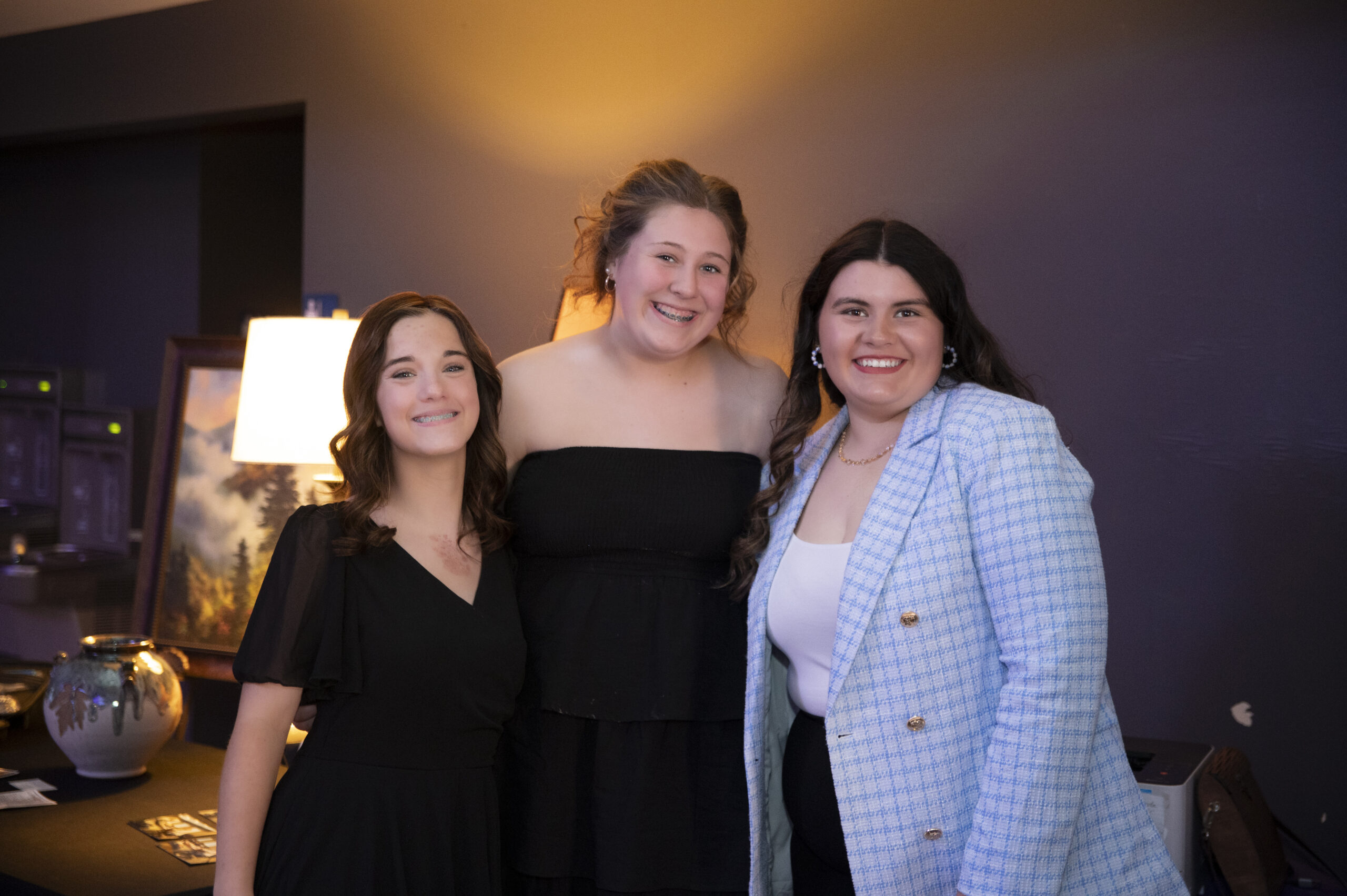 Volunteers helping at The King's Academy Legacy Gala