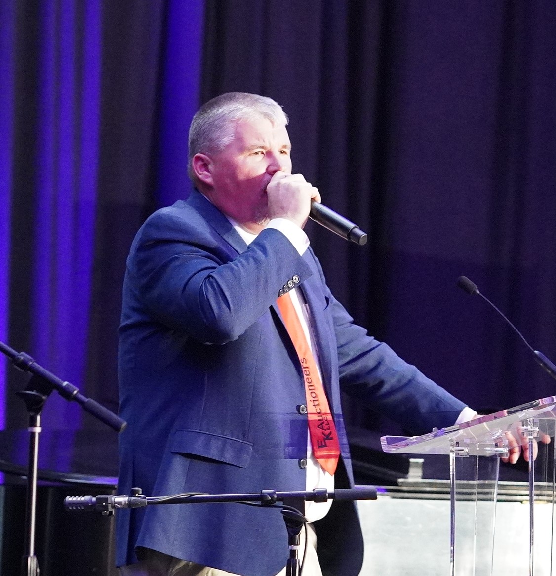 Ed Knight leading the live auction at the 2026 Legacy Gala