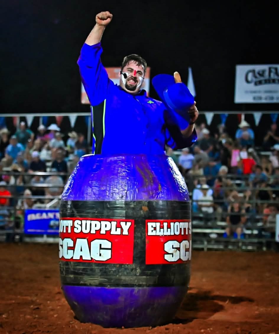 Kyler Collins inside a rodeo barrel during an event