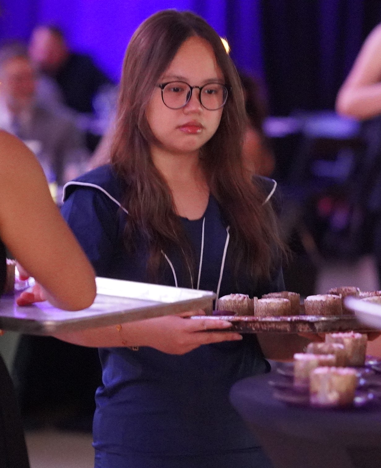 TKA student serving guests at the 2026 Legacy Gala
