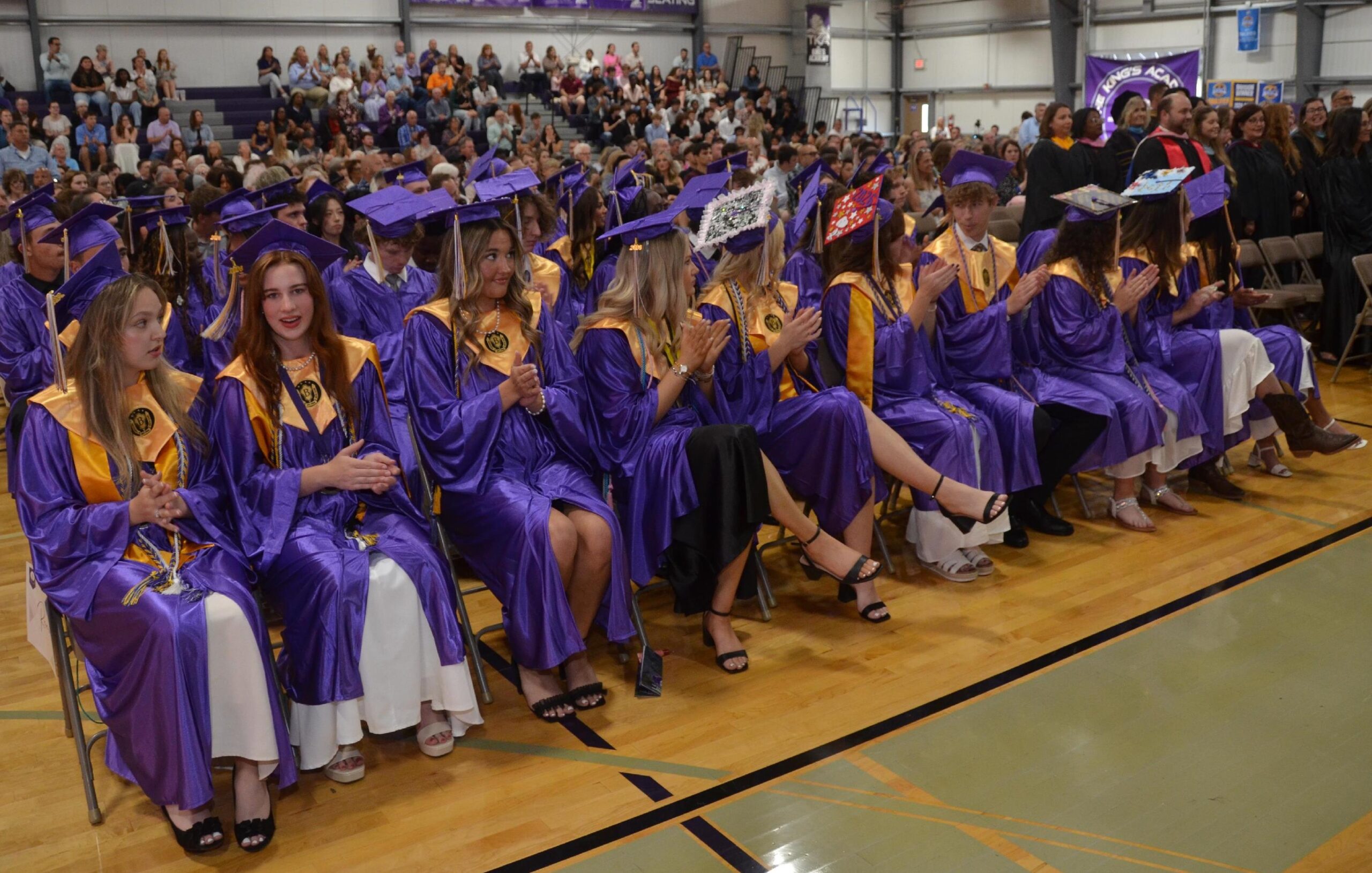 Commencement gathering in the Polly Enix Tibbetts Building