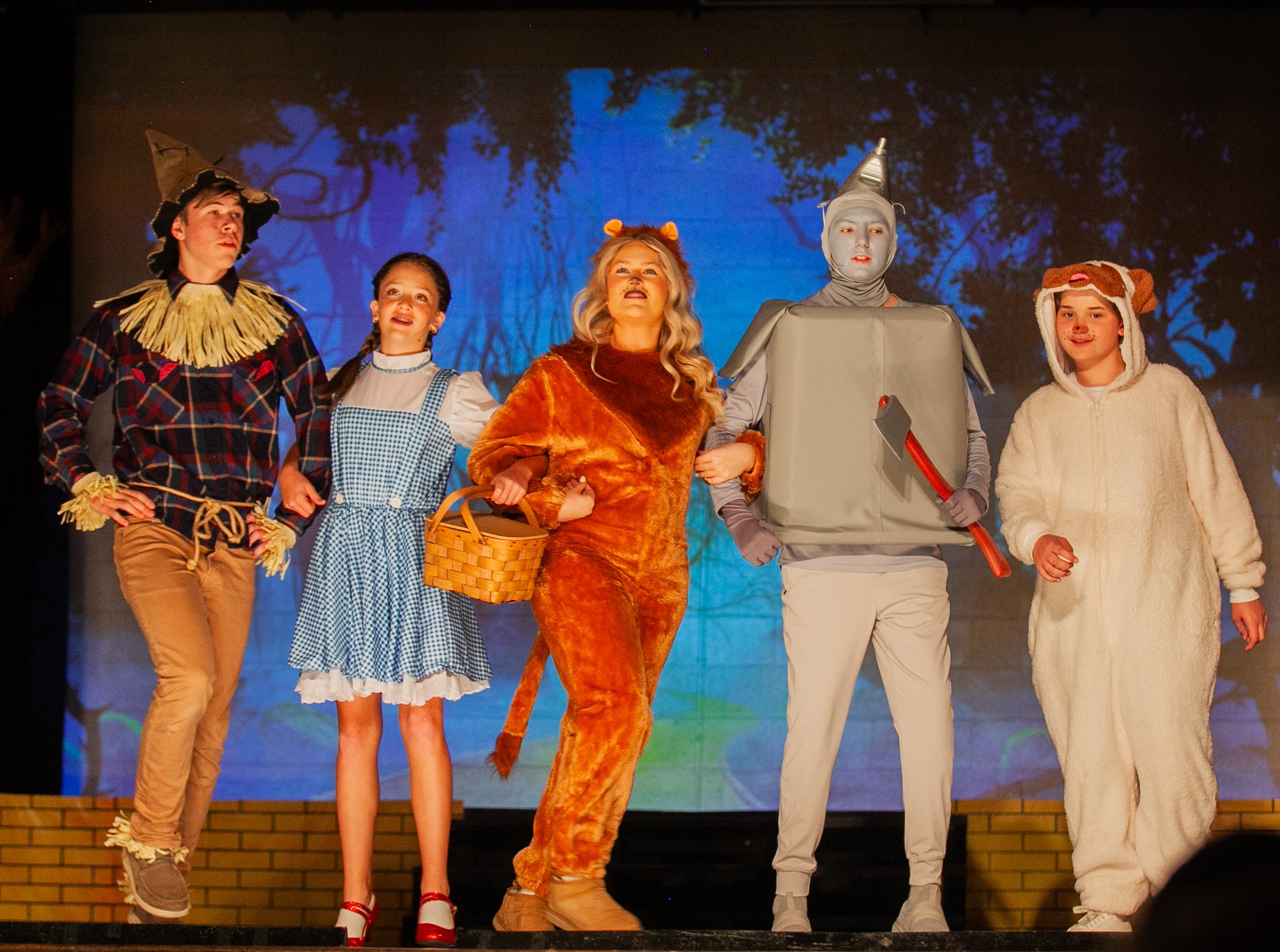 Cast members performing The Wizard of Oz at The King's Academy
