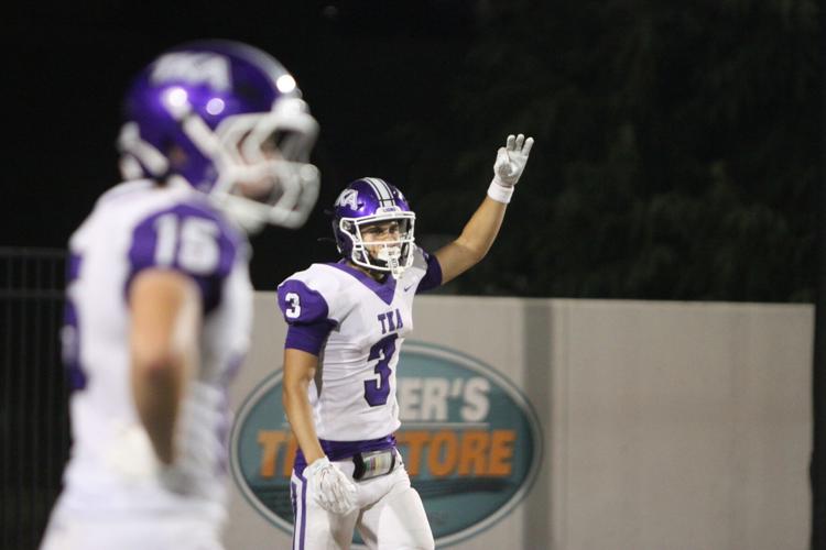 The King’s Academy football player signaling during game action